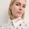 BLUSA CON ESTAMPADO INTEGRAL DISNEY X KL
