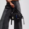 BOLSA PARA CÁMARA DE DENIM RECUBIERTA