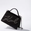 Bolso bandolera pequeño con tachuelas K/Signature