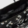 Bolso cambiador con estampado integral Baby Ikon