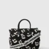Bolso cambiador con estampado integral Baby Ikon