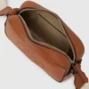 BOLSO CRUZADO PERFORADO K/CIRCLE