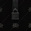 Bolso tipo baúl con candado K/Autograph y pedrería