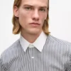Camisa a rayas con cuello en contraste