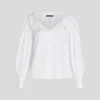 CAMISA CON HOMBROS DESCUBIERTOS