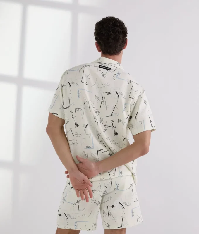 CAMISA DE BOLOS CON ESTAMPADO INTEGRAL