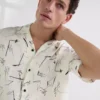 CAMISA DE BOLOS CON ESTAMPADO INTEGRAL