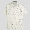 CAMISA DE BOLOS CON ESTAMPADO INTEGRAL