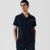 CAMISA DE TOALLA CON LOGOTIPO