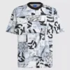 Camiseta holgada con monograma estampado en toda la prenda.