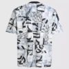 Camiseta holgada con monograma estampado en toda la prenda.