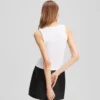 CAMISETA SIN MANGAS CON CUELLO EN V Y RIBETE