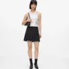 Camiseta sin mangas con ribete recubierto