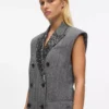 Chaleco de tweed con solapas de lentejuelas