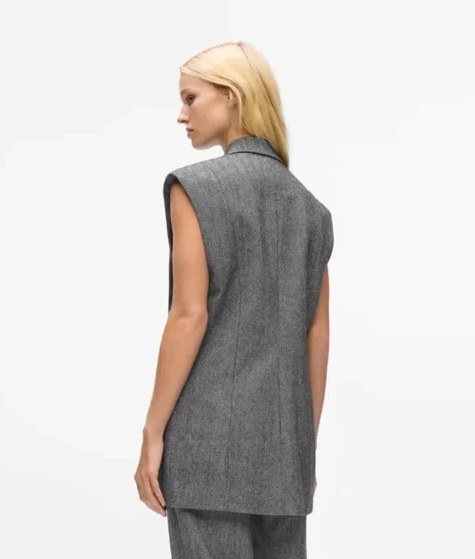 Chaleco de tweed con solapas de lentejuelas