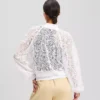 CHAQUETA BOMBER CON BORDADO DE ORQUÍDEAS