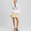 CHAQUETA BOMBER CON BORDADO DE ORQUÍDEAS
