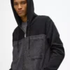 Chaqueta con paneles de denim