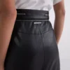 FALDA DE CUERO SINTÉTICO CON DETALLE DE CREMALLERA