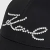GORRA CON TACHUELAS K/SIGNATURE