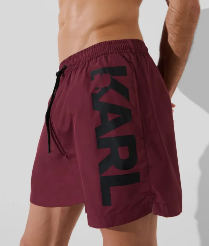 PANTALÓN CORTO CON LOGOTIPO