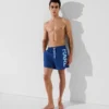 PANTALÓN CORTO CON LOGOTIPO