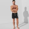 PANTALÓN CORTO CON LOGOTIPO