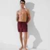 PANTALÓN CORTO CON LOGOTIPO