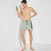 PANTALÓN CORTO CON LOGOTIPO