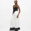 Pantalones anchos plisados