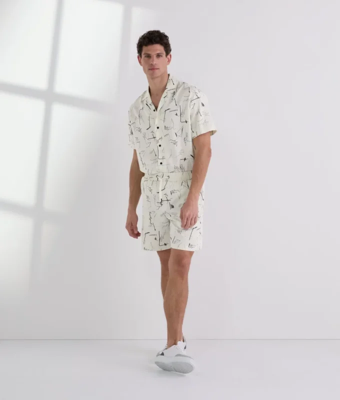 PANTALONES CORTOS CON ESTAMPADO INTEGRAL