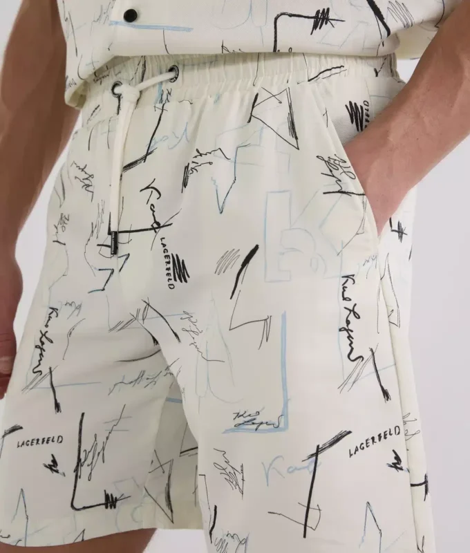 PANTALONES CORTOS CON ESTAMPADO INTEGRAL