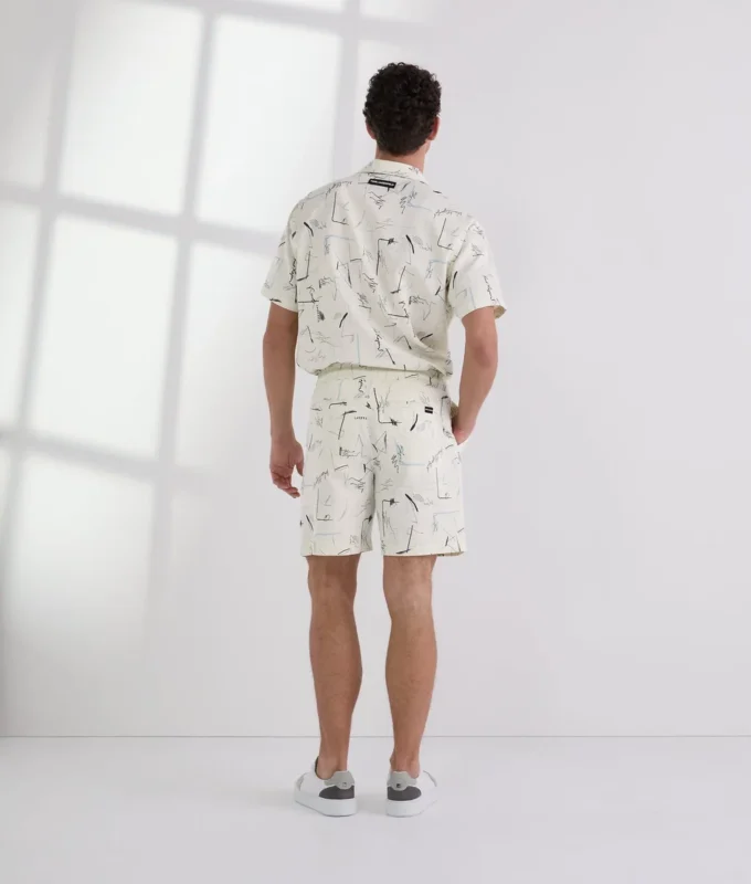 PANTALONES CORTOS CON ESTAMPADO INTEGRAL