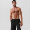 PANTALONES CORTOS DE BAÑO LARGOS CON LOGOTIPO