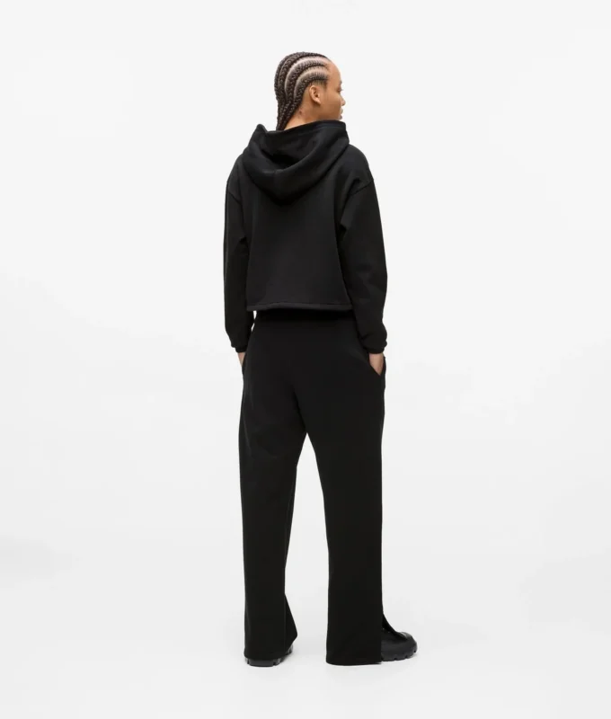 Pantalones de chándal con monograma y tachuelas