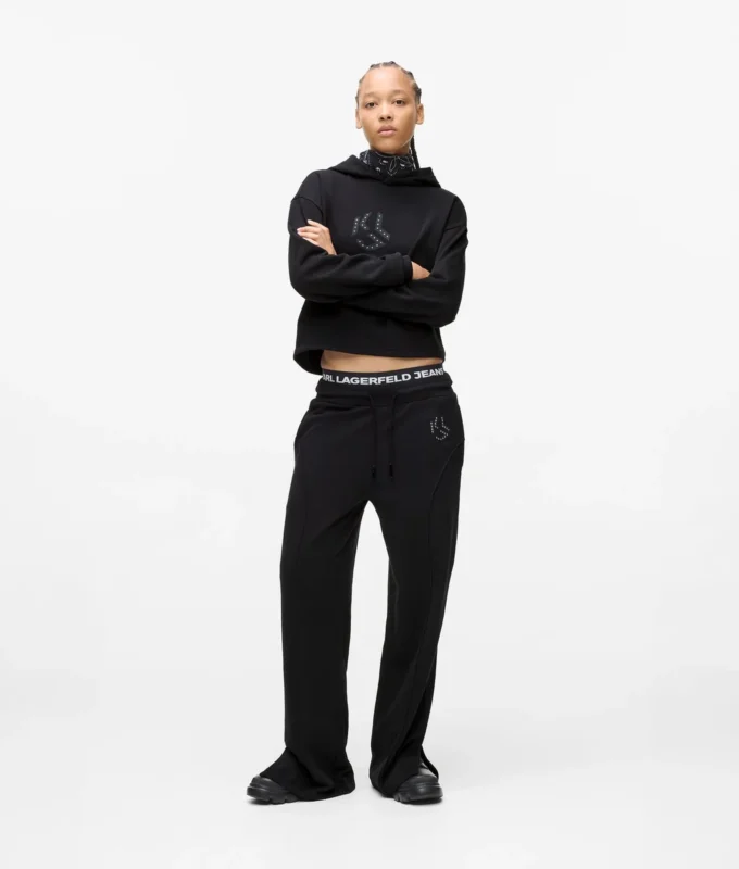 Pantalones de chándal con monograma y tachuelas