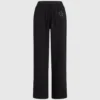 Pantalones de chándal con monograma y tachuelas