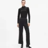 Pantalones de punto con detalles bouclé