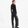 Pantalones de punto con detalles bouclé