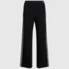 Pantalones de punto con detalles bouclé