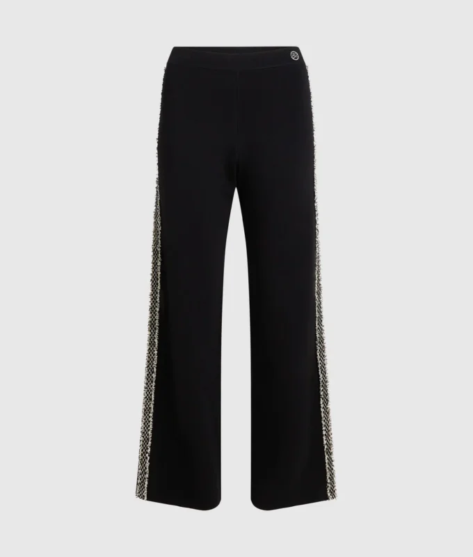 Pantalones de punto con detalles bouclé