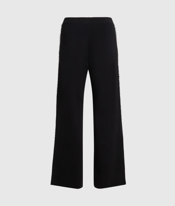 Pantalones de punto con detalles bouclé