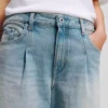 PANTALONES DE VAQUERO ANCHOS PLISADOS
