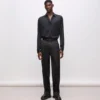 Pantalones KL Studio con detalles de satén