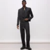 Pantalones KL Studio con detalles de satén