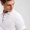 POLO CON BOTONES DE PRESIÓN