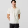 Polo con pin Monogram
