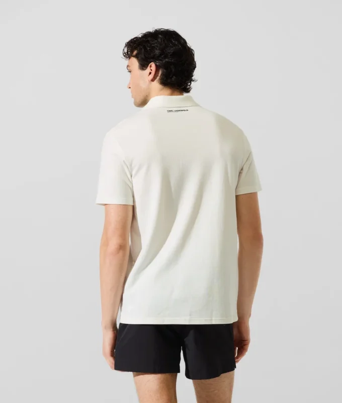 Polo con pin Monogram