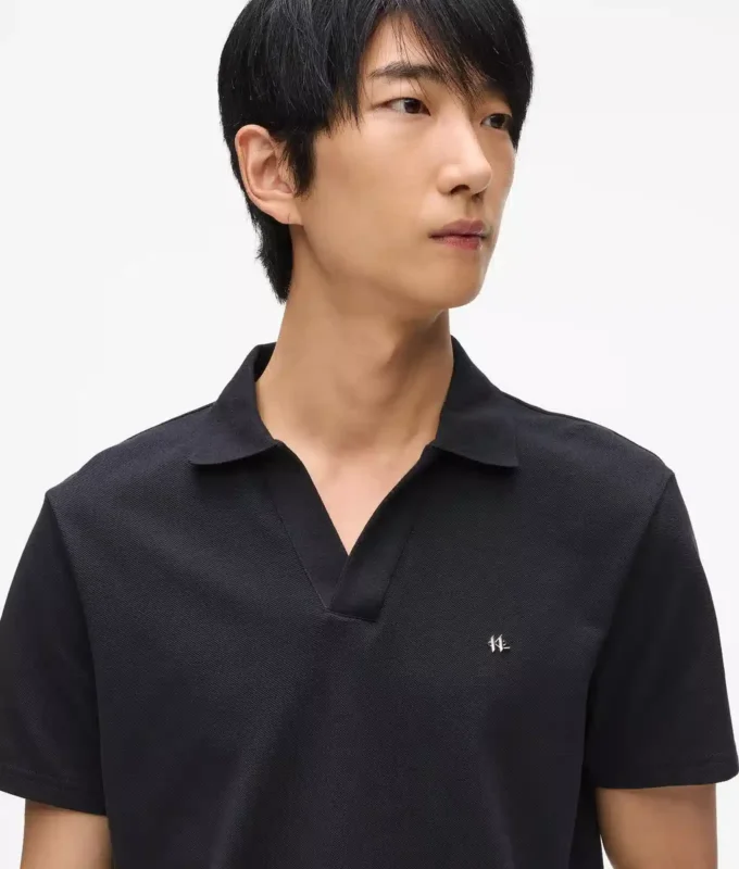 Polo con pin Monogram