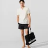 Polo con pin Monogram